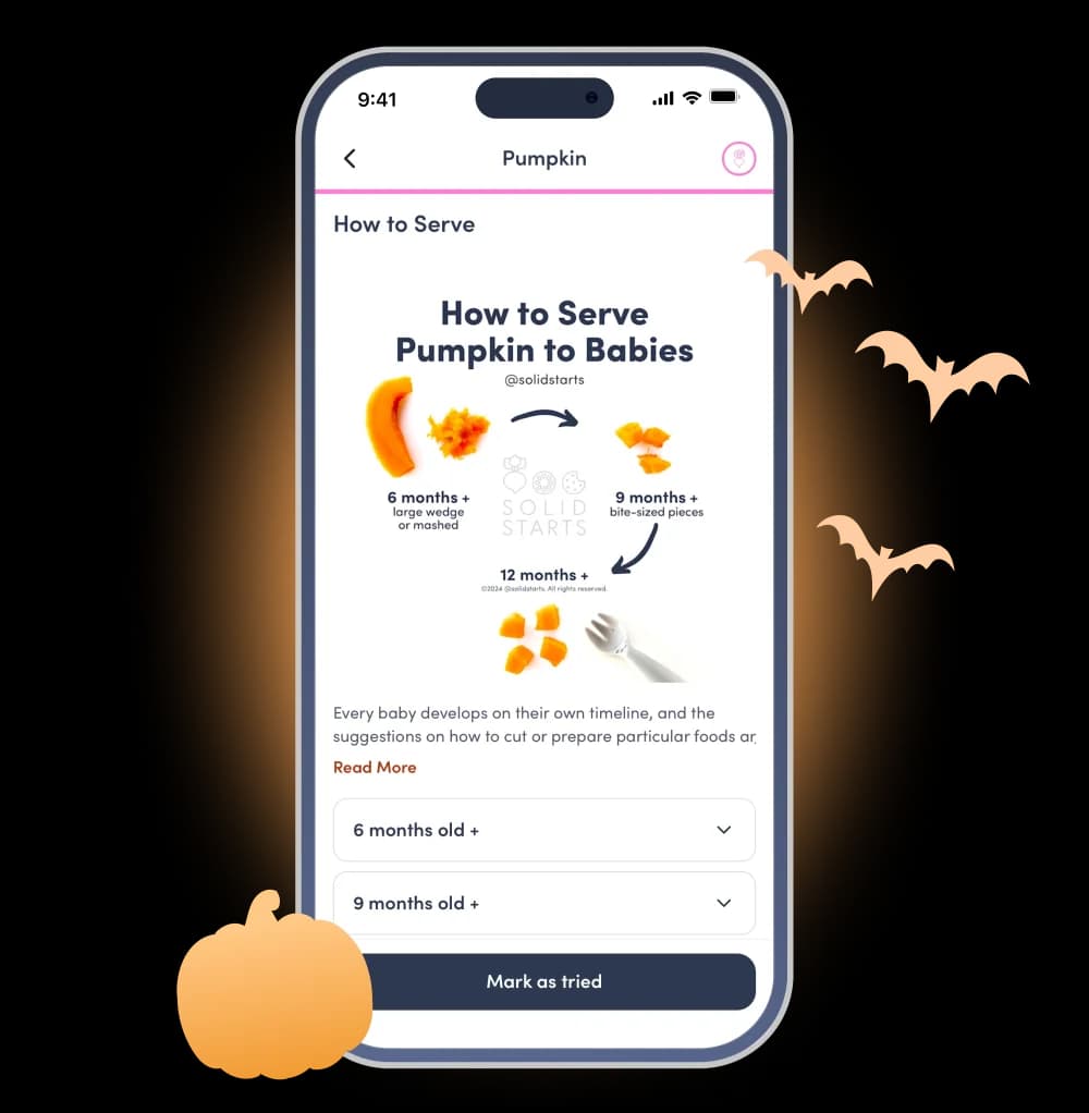 Solid Starts app showing how to serve pumpkin to babies, with bats and a pumpkin around the phone